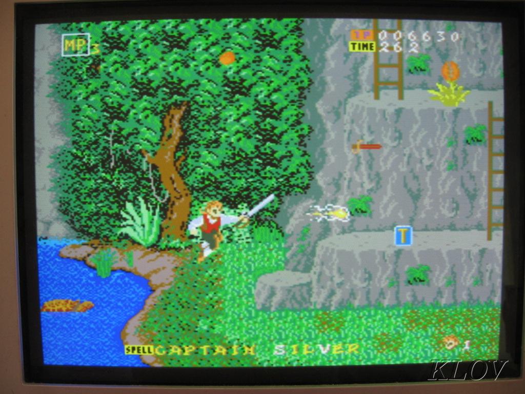 Photographed arcade CRT, with original KLOV watermark intact. This is screen context, not evidence of a factory-dedicated cabinet.