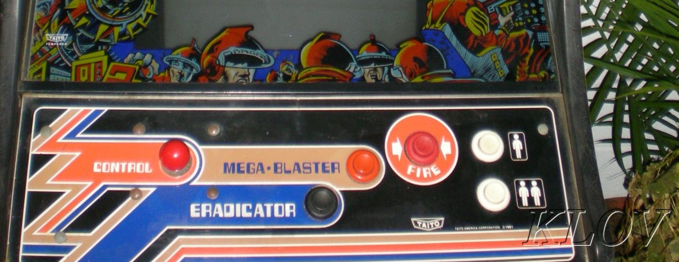 Colony 7 control-panel detail: joystick, Mega-Blaster, Eradicator, Fire and start controls. Deterministic crop of a Museum of the Game / KLOV photograph; watermark retained.