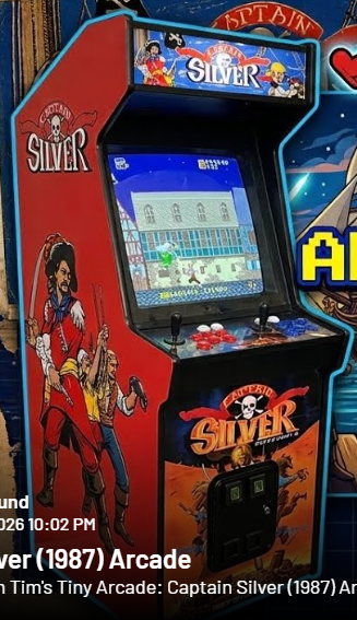 Cabinet detail cropped from promotional artwork accompanying Tim’s Tiny Arcade, “Captain Silver (1987) Arcade,” shared by Twin Galaxies on August 23, 2026. The underlying cabinet’s provenance is unverified; this illustration is not documentation of an original factory cabinet.